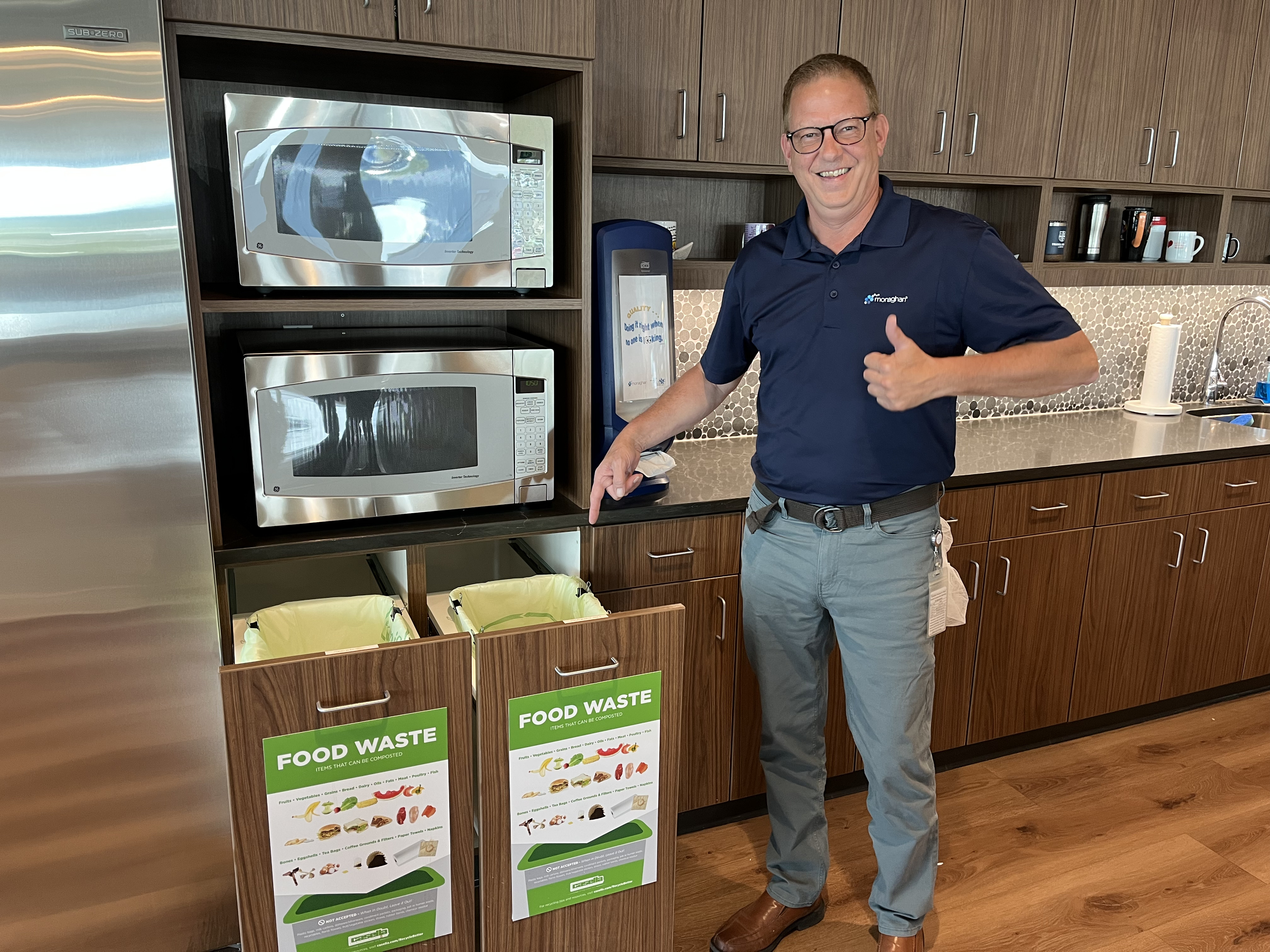 Food Waste bin shown by man
